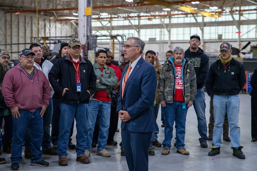 AMCOM Deputy to the Commanding General, Bill Marriott, speaks to employees at Corpus Christi Army Depot, Texas, last month. Marriott is retiring after 44 years of federal service.