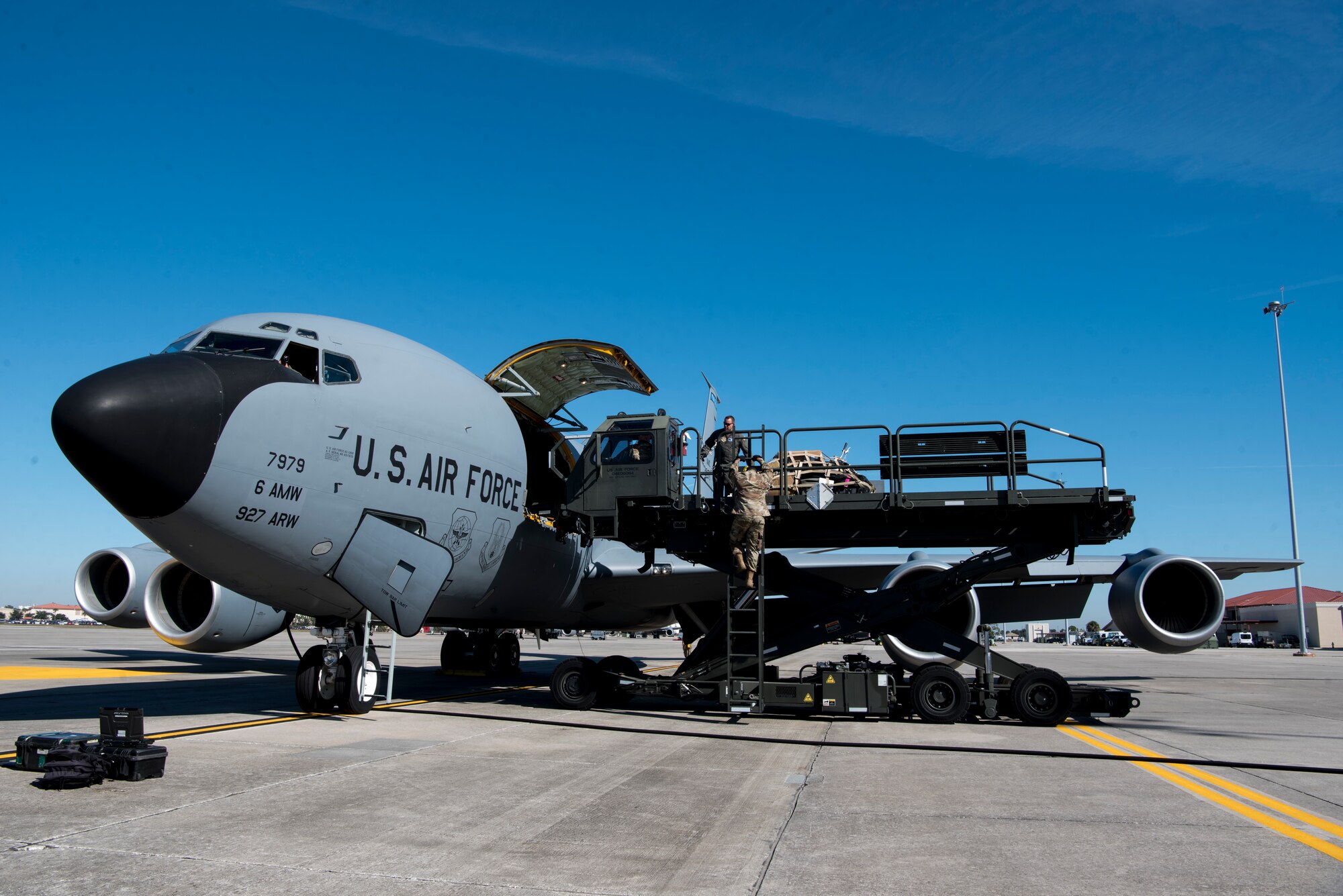 Members of the 6th Logistics Readiness Squadron and the 6th Operations Group load cargo onto a KC-135 Stratotanker aircraft at MacDill Air Force Base, Fla., Dec. 6, 2019.
