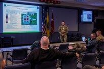 Members of U.S. Army North (ARNORTH) and U.S. Army Forces Command (FORSCOM) discuss concepts of support during an exercise Vibrant Response 20 (VR20) mid-planning meeting at JTF-CS headquarters here. During the meeting, JTF-CS leadership, along with representatives from ARNORTH and FORSCOM, discussed training objectives, deployment operations and other topics related to VR20. (Official DoD photo by Mass Communication Specialist 3rd Class Michael Redd/RELEASED)