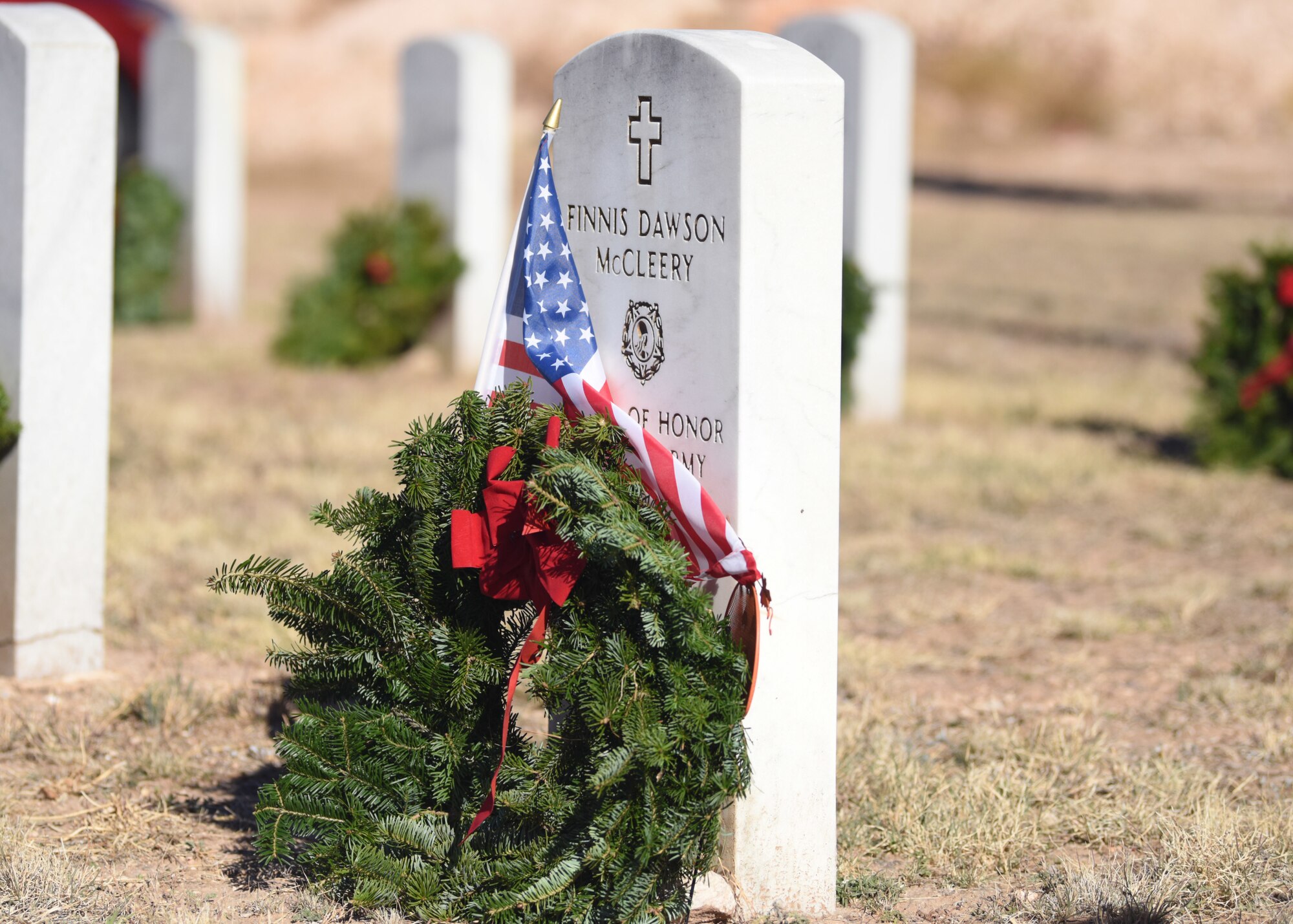 Finnis Dawson McCleery’s grave is adorned with a wreath at Belvedere Memorial Cemetery at Wreaths Across America in San Angelo, Texas, Dec. 14, 2019. Wreaths represent eternity, continuity, and memory. (U.S. Air Force photo by Airman 1st Class Ethan Sherwood)