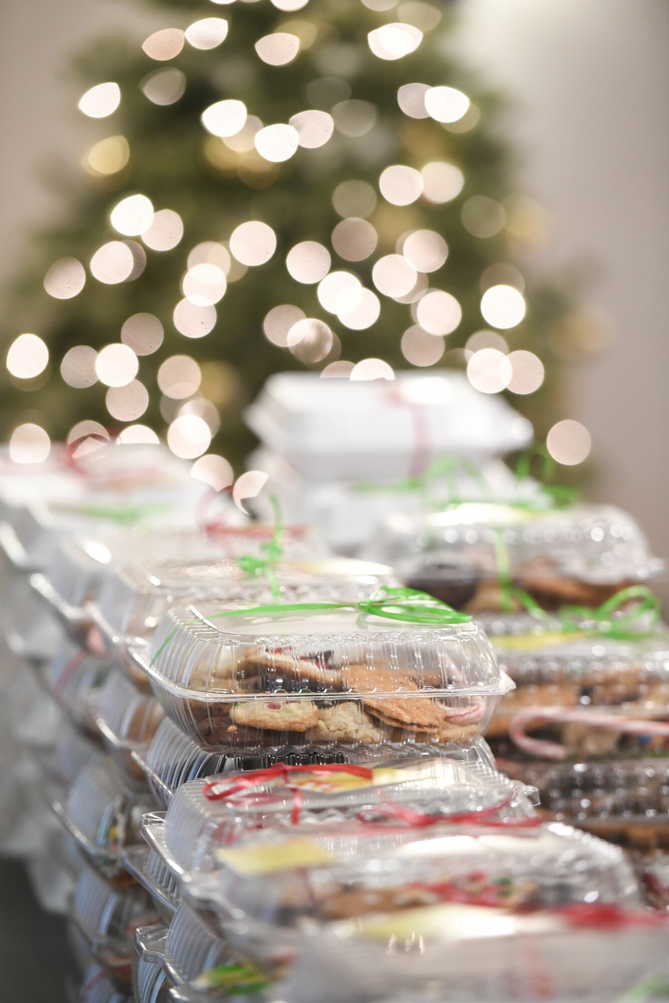 Holiday cookie packages await to be delivered to various Airmen across Hill Air Force Base, Utah, Dec. 16, 2019.  Every year, during the annual Team Hill Airmen Cookie Drive, volunteers bake, collect, package and deliver cookies to the base's Airmen. (U.S. Air Force photo by Cynthia Griggs)