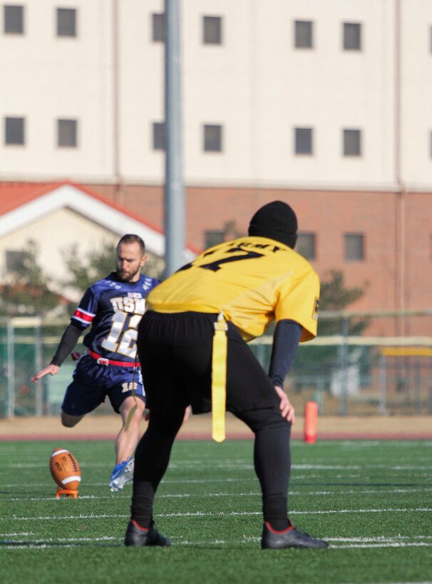 Marines, Sailors, and Soldiers competed om the Army vs. Navy flag football game aboard USAG Camp Humphreys 24 December. The teams played head to head for a trophy and bragging rights, while building comradery between services. (U.S. Marine Corps photo by Sgt. Parker R. Golz)