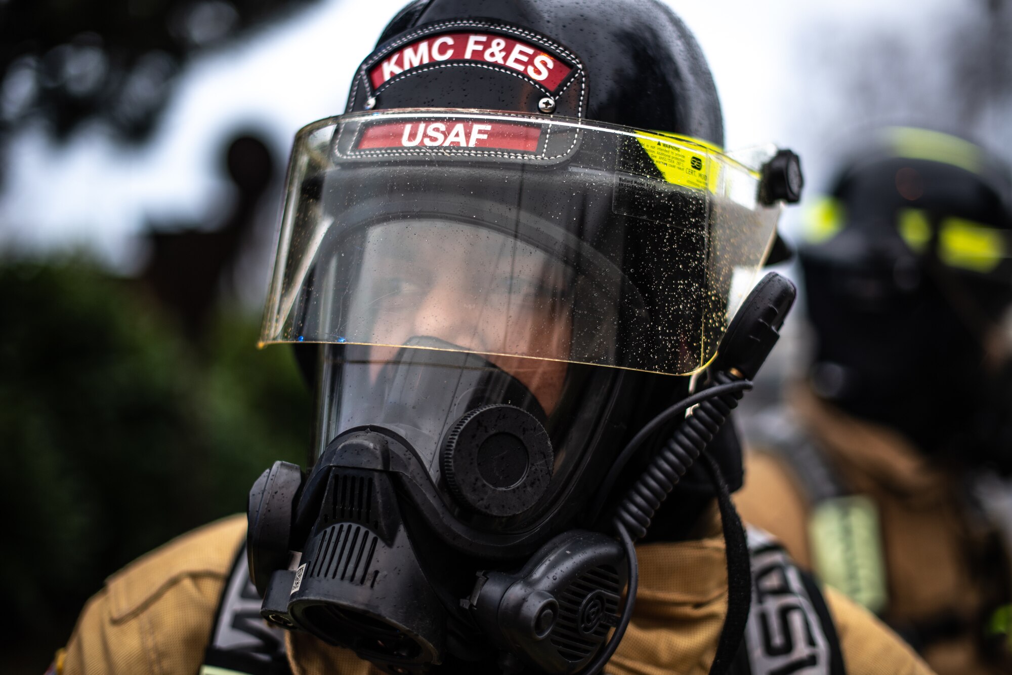 A U.S. Air Force firefighter assigned to the 86th Civil Engineer Squadron prepares to conduct a simulated decontamination line during exercise Operation Varsity 19-04 at Ramstein Air Base, Germany, Dec. 12, 2019. Response teams reacted to a simulated chemical attack which tested their ability to conduct decontamination procedures on the affected personnel. Exercises like Operation Varsity gives every Airman an opportunity to improve readiness in their respective Air Force specialty. (U.S. Air Force photo by Staff Sgt. Devin Boyer)