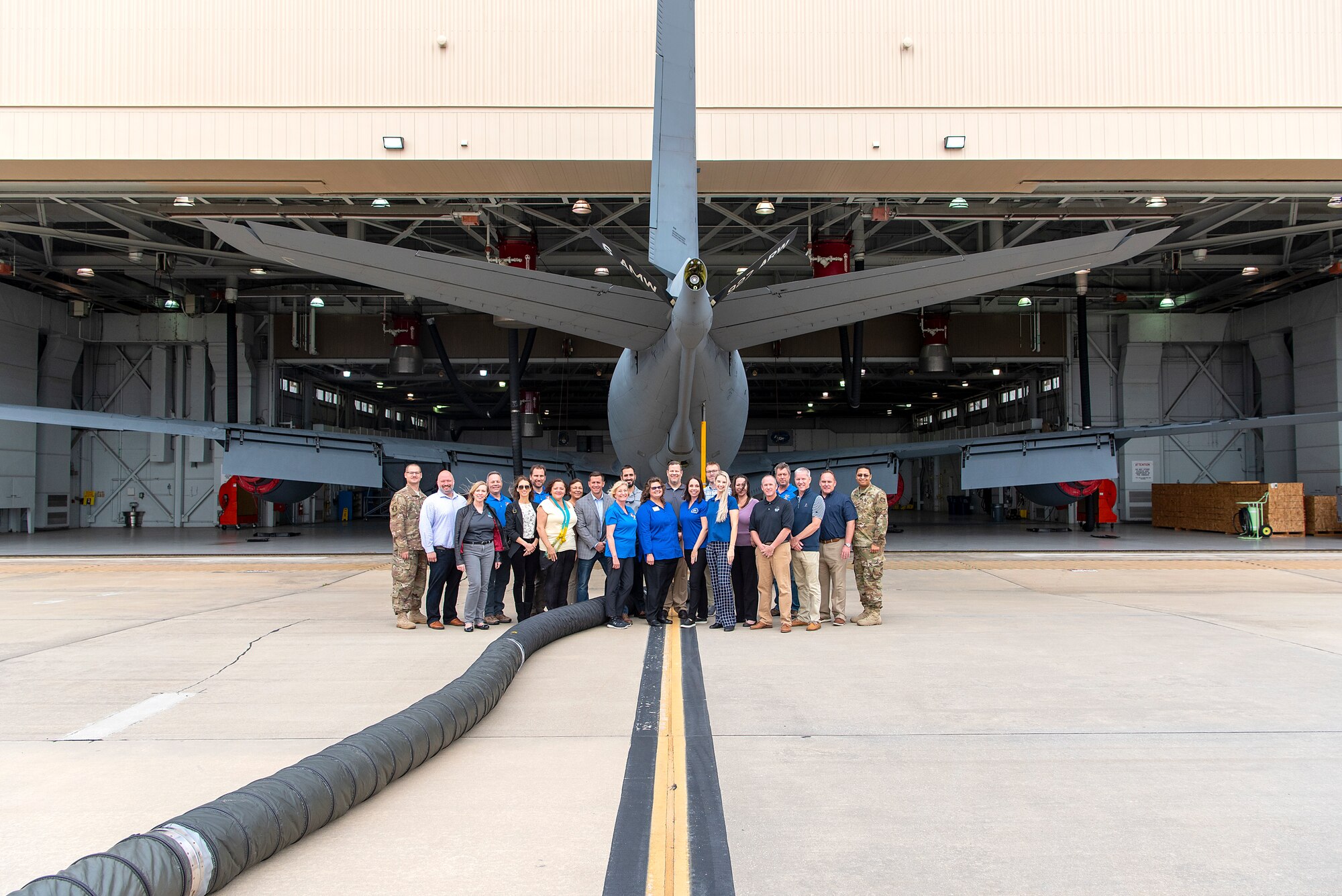 Honorary commanders from the 6th and 927th air refueling wings pause for a group photo in front of a KC-135 Stratotanker at MacDill Air Force Base, Fla., Dec. 12, 2019. The honorary commanders toured the 6th Maintenance Group to gain first-hand experience on how the mission gets accomplished.