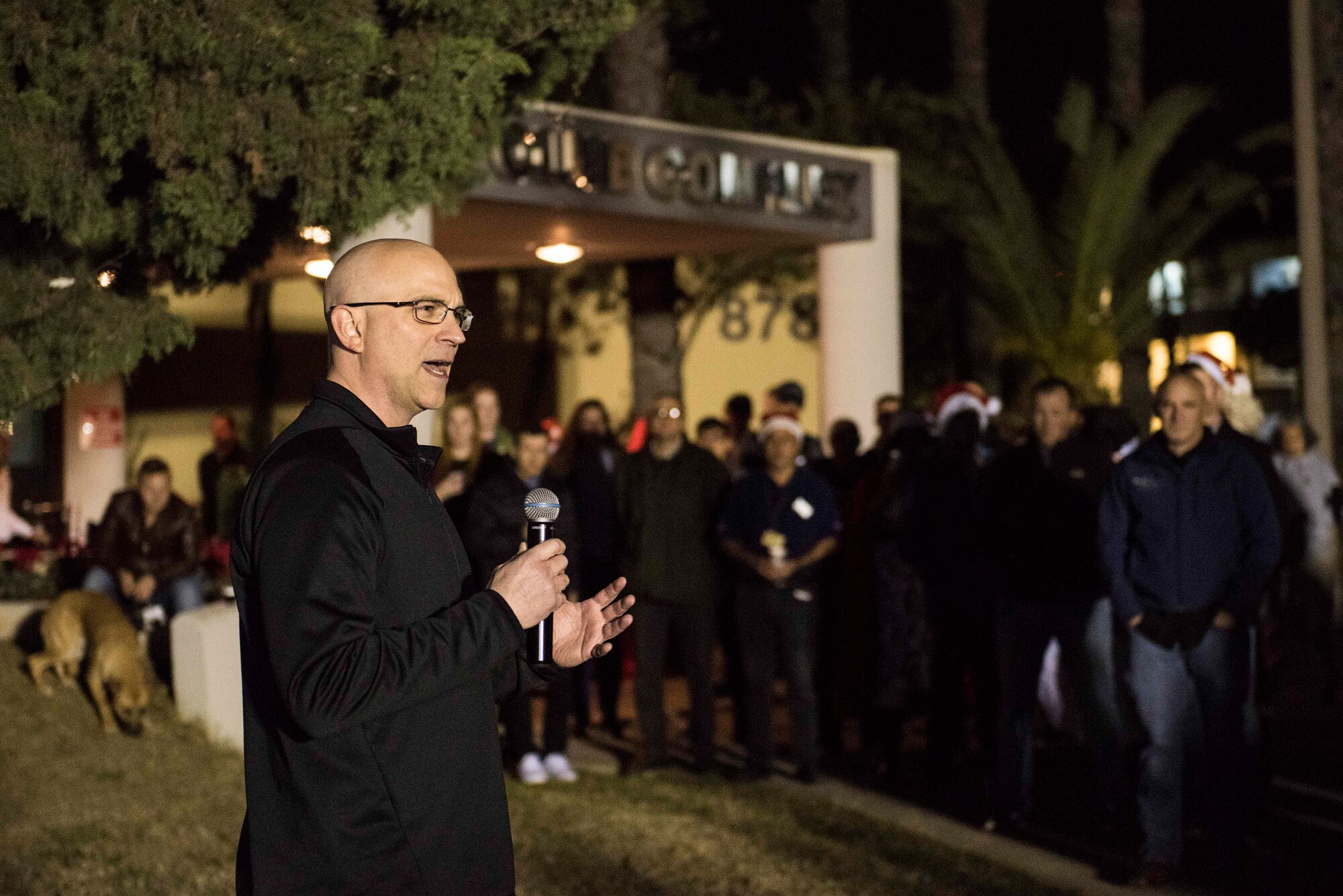 U.S. Air Force Col. John Hawkings, 39th Air Base Wing vice commander, provides opening remarks during the base Christmas tree lighting ceremony Dec. 5, 2019, at Incirlik Air Base, Turkey. These ceremonies are common holiday season activities at U.S. Air Force bases around the world. (U.S. Air Force photo by Staff Sgt. Joshua Magbanua)
