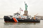 Coast Guard Cutter Line, a 65-foot small harbor tug, sits in the Upper Bay of New York Harbor near the Statue of Liberty, February 6, 2018. The Line is an homeported in Bayonne, New Jersey, and is one of 11 small ice breaking tugs. (U.S. Coast Guard photo by Petty Officer 3rd Class Steve Strohmaier)