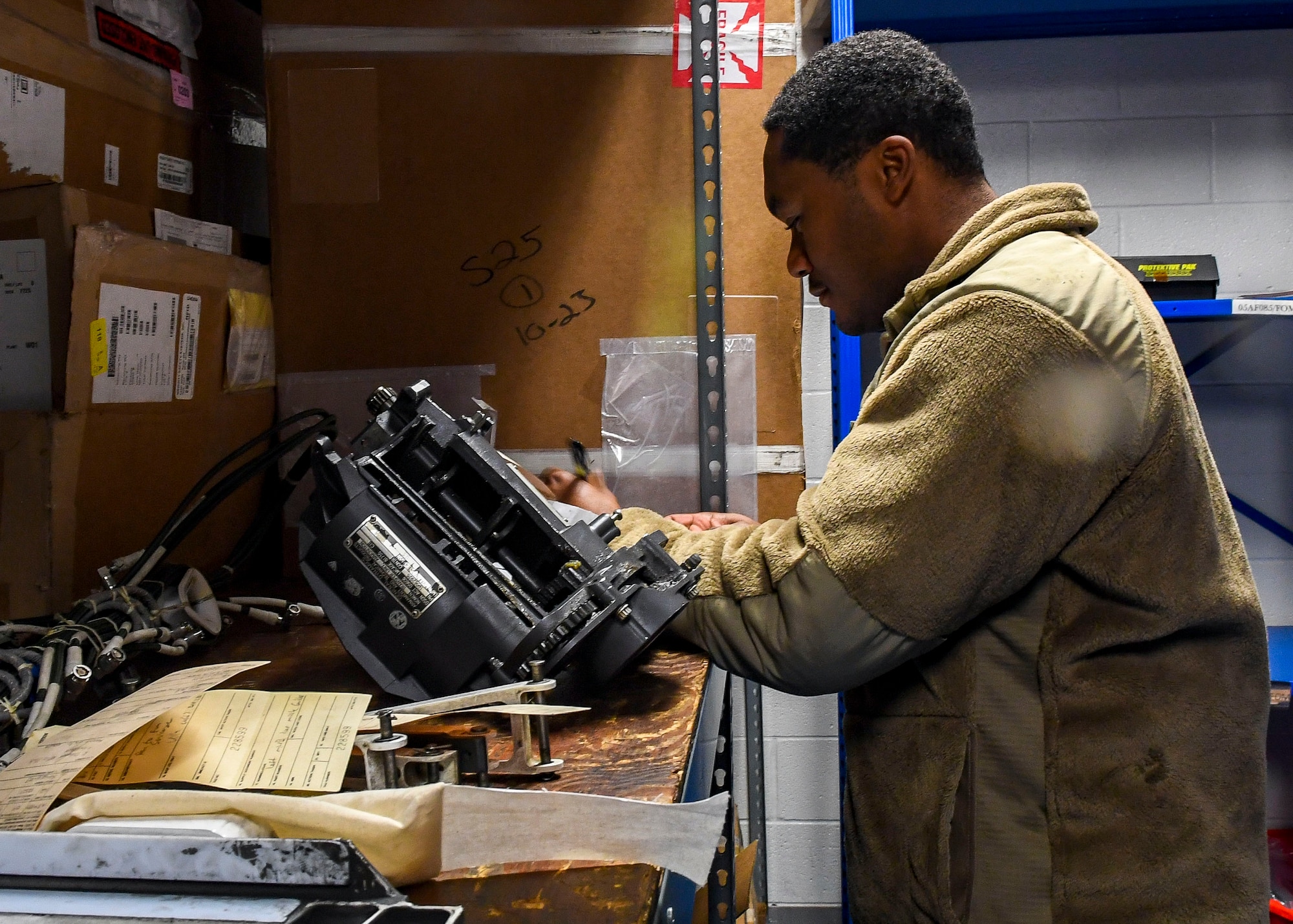 U.S. Air Force Senior Airman Tahjee Crocket, decentralized materiel support technician, checks inventory at Joint Base Langley-Eustis, Virginia, Dec. 13, 2019.