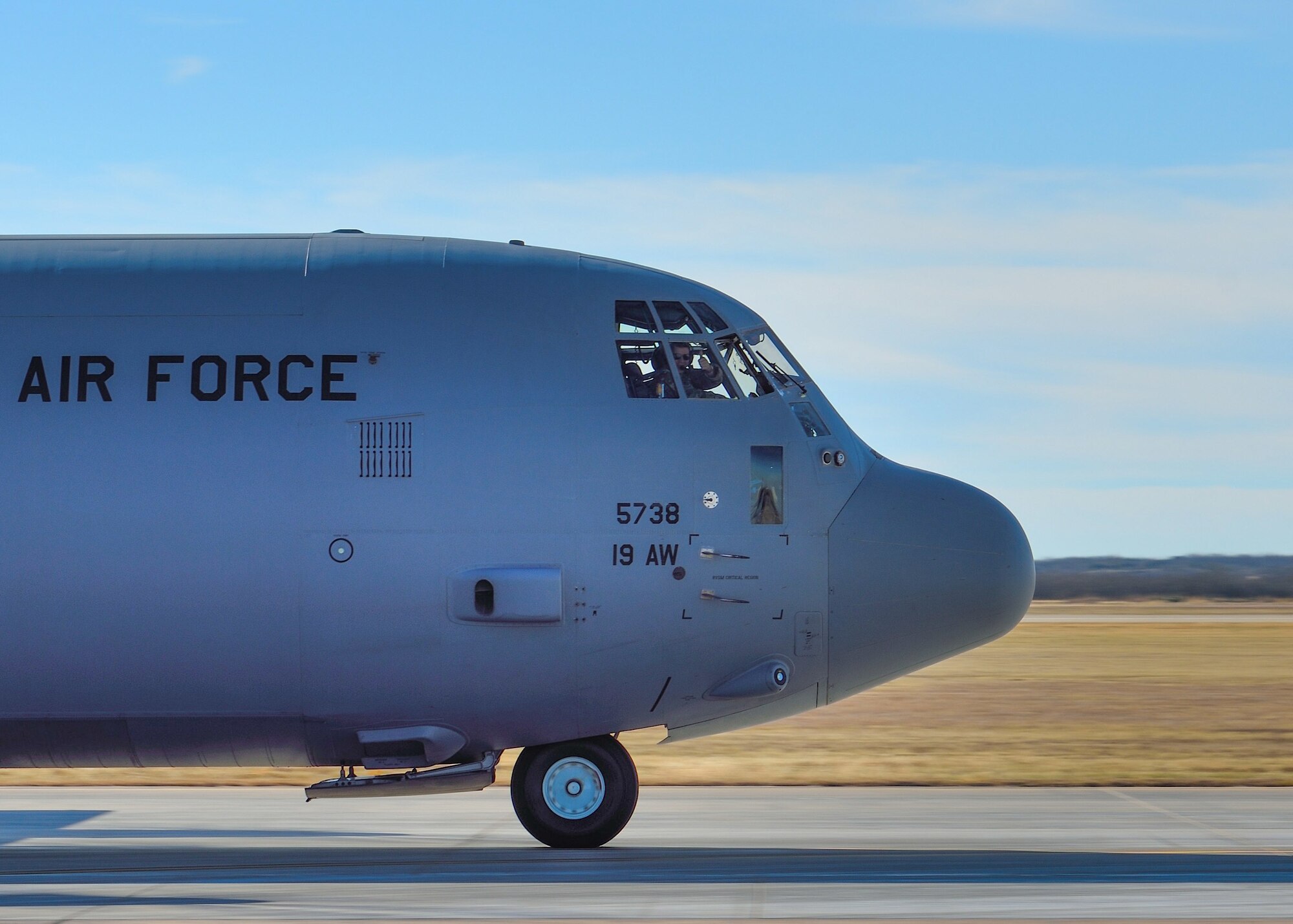 a C-130 takes off