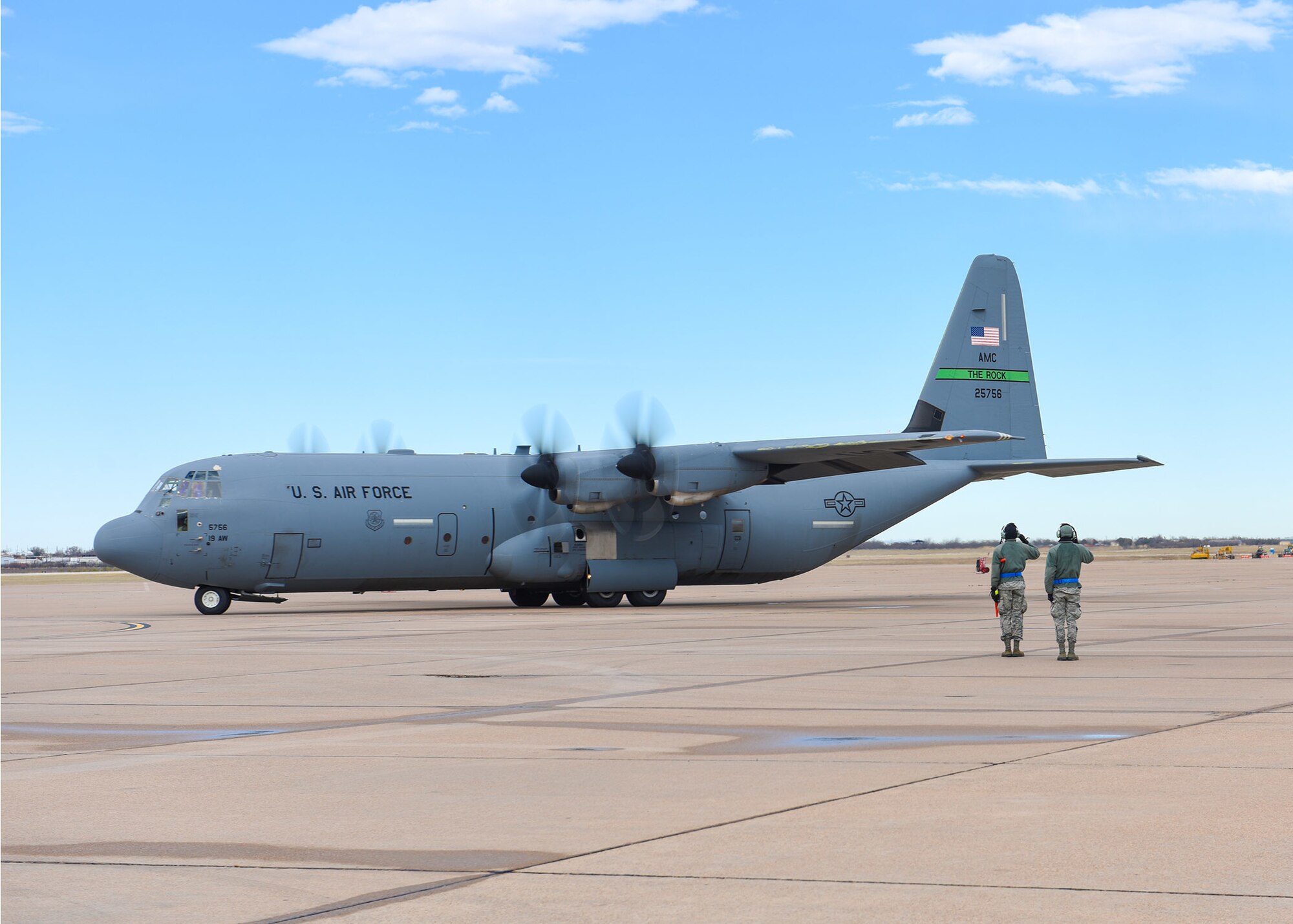 a C-130 takes off
