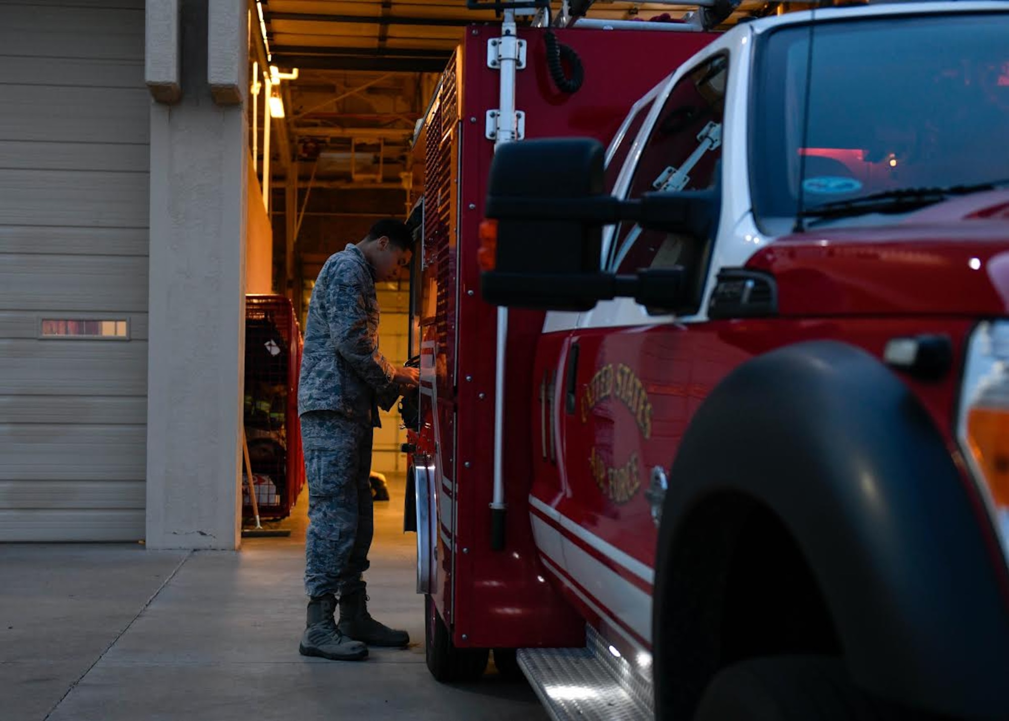 Senior Airman Domitrius Johnson, 56th Civil Engineer Squadron driver operator, inspects a P-34 Rapid Intervention Vehicle (RIV) before beginning his shift Dec. 9, 2019, at the Luke Air Force Base Fire Department at Luke AFB, Ariz.