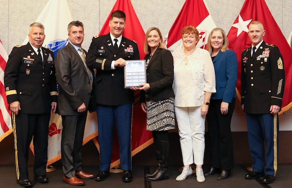 During the 2019 Society of American Military Engineers Federal Small Business Conference Excellence in Contracting Awards Program Nov. 21, 2019 in Dallas, Texas, Lt. Gen. Todd Semonite (left), Commanding General of the U.S. Army Corps of Engineers, and USACE Command Sgt. Maj. Bradley Houston (right) presented Jeff Roberts, Huntsville Center contracting; Col. Marvin Griffin, Huntsville Center commander; Brandy Percell, Huntsville Center Office of Small Business Initiative; Colleen O’Keefe, Huntsville Center Contracting chief and Kristina Freese, Huntsville Center Business Director, with three Top Dollar awards. The Center took 1st Place in Small Business ($790 million), 1st Place in Small Disadvantaged Business ($416 million) and 2nd Place in Service Disabled Veteran Owned Small Business ($98.6 million.) Over the last decade, Huntsville Center contracts have allocated more than $6 billion to small business for their services in supporting the Center's global mission.