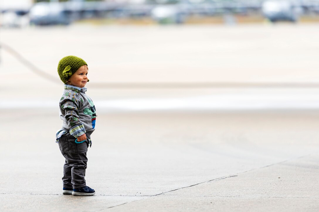 A photo of a participant on the flightline waiting for Santa.