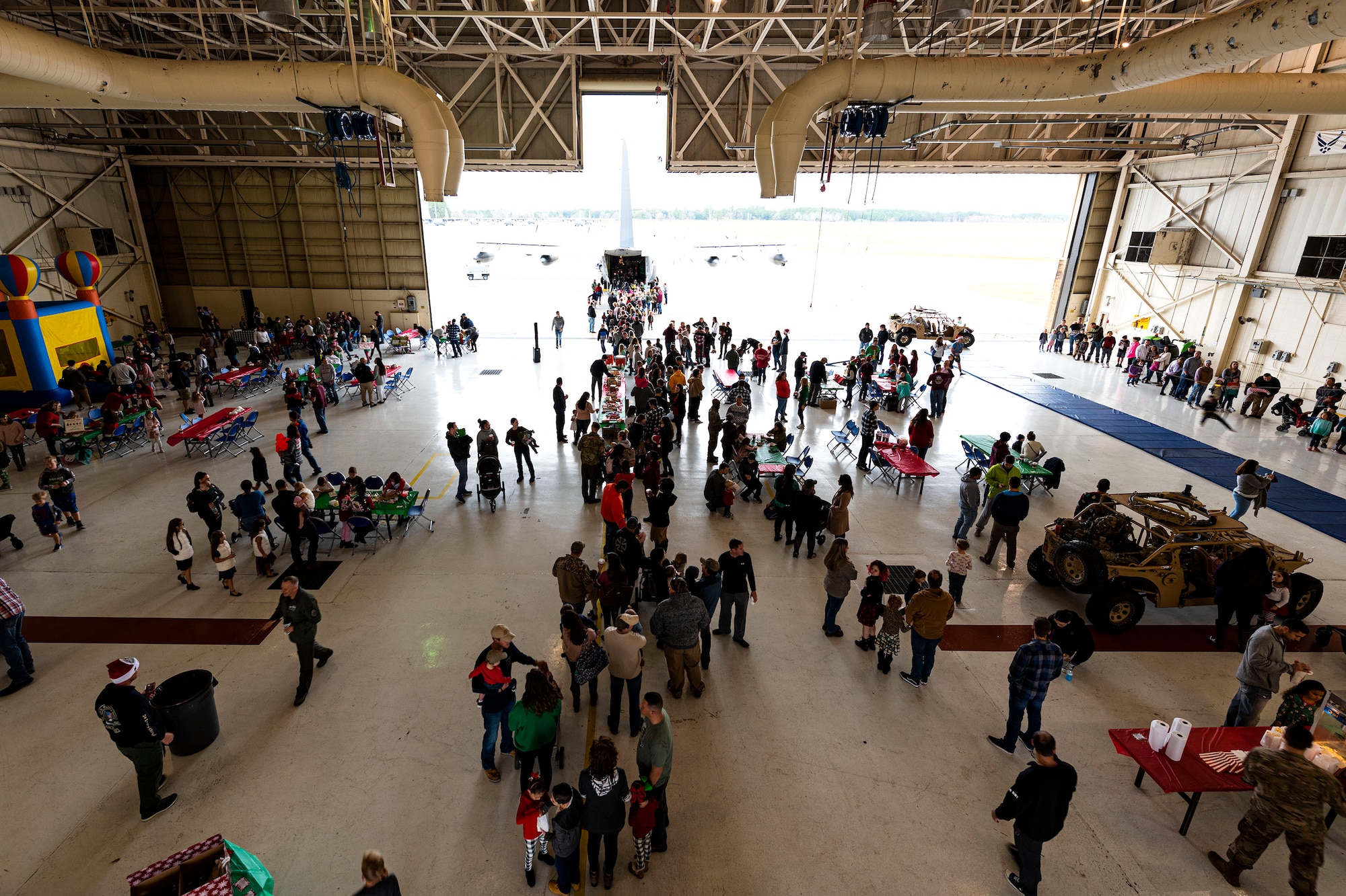 A photo of participants taking part in a children's Christmas party.