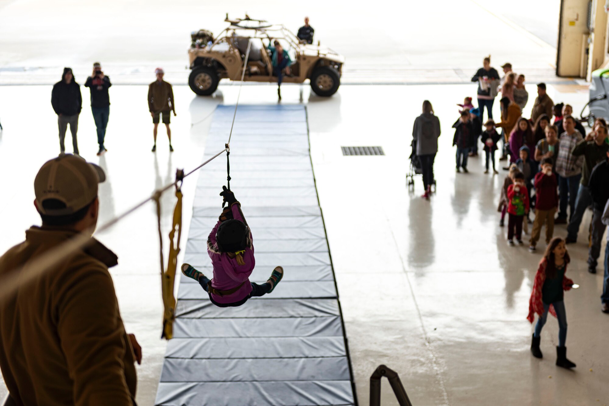 A photo of a participant zip-lining.