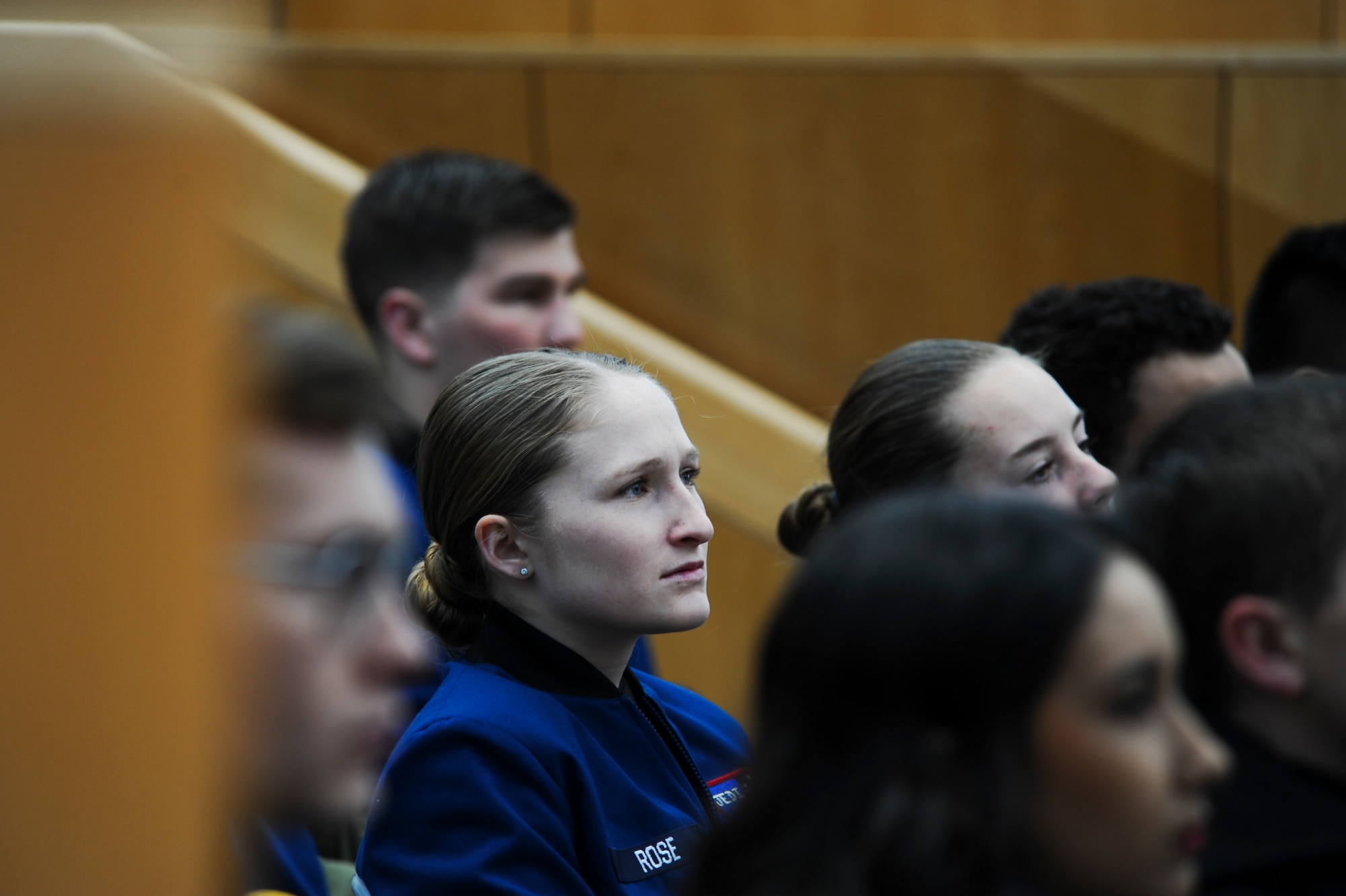 An Air Force Academy cadet listens intently to a guest speaker during the National Character and Leadership Symposium at the US Air Force Academy, 23 February 2018. The two-day symposium provided an opportunity for all Academy personnel, visiting university students and faculty, and community members to experience dynamic speakers and take part in group discussions to enhance their own understanding of the importance of sound moral character and good leadership. (US Air Force photo by TSgt Julius Delos Reyes)