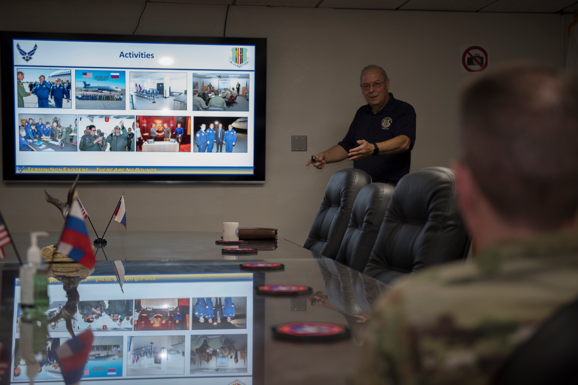 Sal Pampinella, left, International Treaty Compliance Office staff member, briefs Col. Jeffrey Nelson, right, 60th Air Mobility Wing commander, about the office’s mission Dec. 13, 2019, at Travis Air Force Base, California. Pampinella manages and directs all activities that involve foreign visitors. Nelson toured the International Treaty Compliance Office as part of the Leadership Rounds, a program that allows base leadership to connect with personnel and gain a more in-depth understanding of each section on base. (U.S. Air Force photo by Airman 1st Class Cameron Otte)