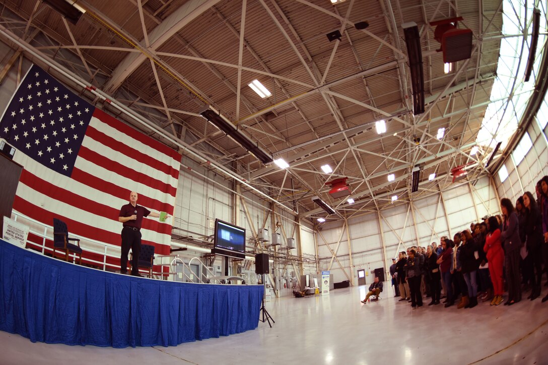 South Carolina Air National Guard personnel assemble in the aircraft hangar to participate in personal resilience training.