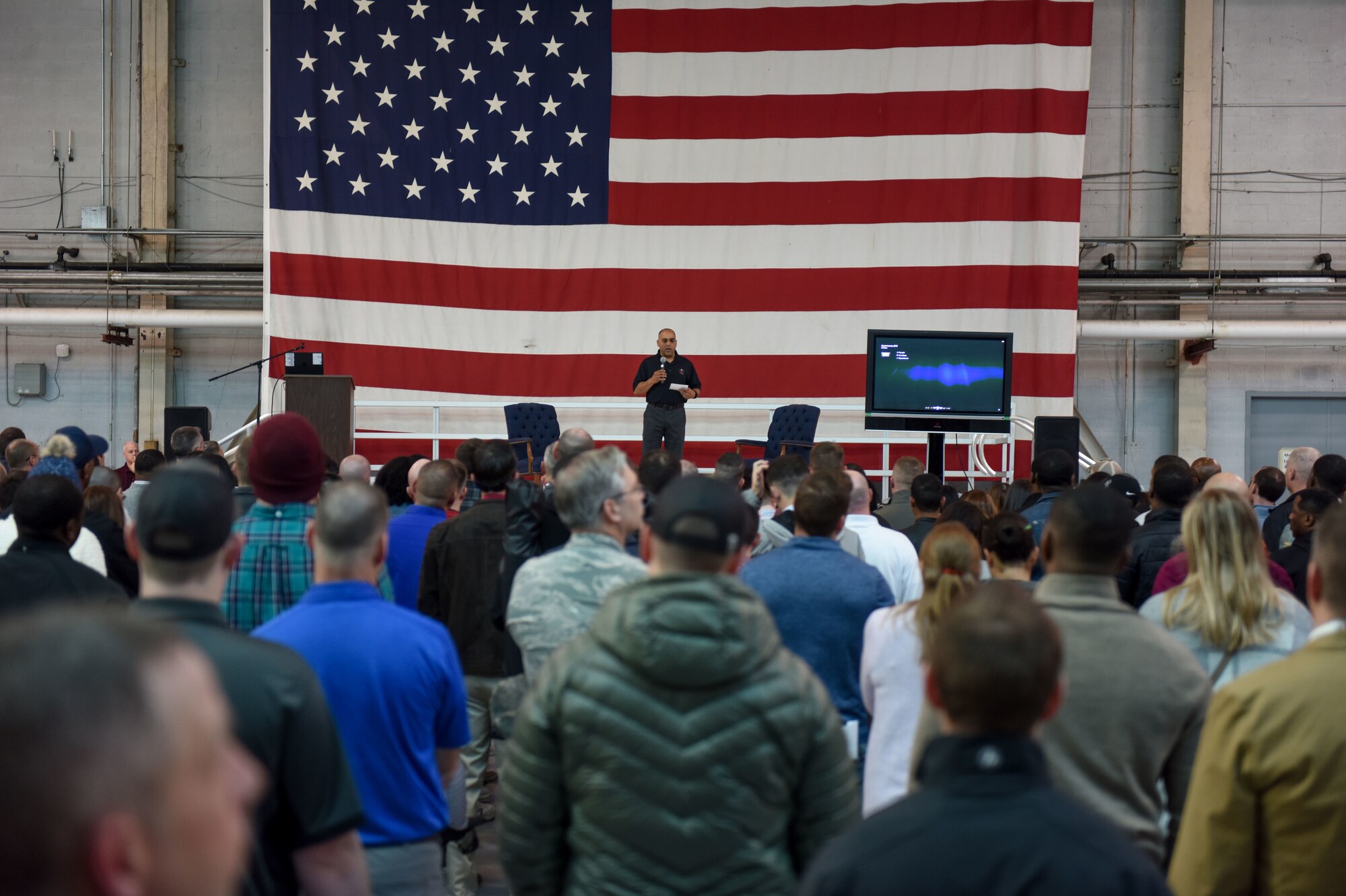 South Carolina Air National Guard personnel assemble in the aircraft hangar to participate in personal resilience training.