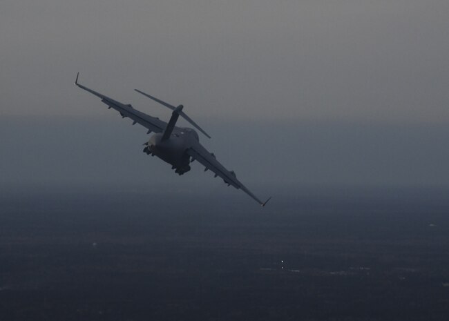 An aircraft flies in the sky.