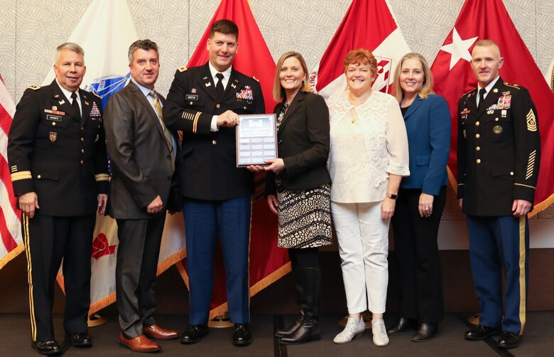 During the 2019 Society of American Military Engineers Federal Small Business Conference Excellence in Contracting Awards Program Nov. 21, 2019 in Dallas, Texas, Lt. Gen. Todd Semonite (left), Commanding General of the U.S. Army Corps of Engineers, and USACE Command Sgt. Maj. Bradley Houston (right) presented Jeff Roberts, Huntsville Center contracting; Col. Marvin Griffin, Huntsville Center commander; Brandy Percell, Huntsville Center Office of Small Business Initiative; Colleen O’Keefe, Huntsville Center Contracting chief and Kristina Freese, Huntsville Center Business Director, with three Top Dollar awards. The Center took 1st Place in Small Business ($790 million), 1st Place in Small Disadvantaged Business ($416 million) and 2nd Place in Service Disabled Veteran Owned Small Business ($98.6 million.) Over the last decade, Huntsville Center contracts have allocated more than $6 billion to small business for their services in supporting the Center's global mission.