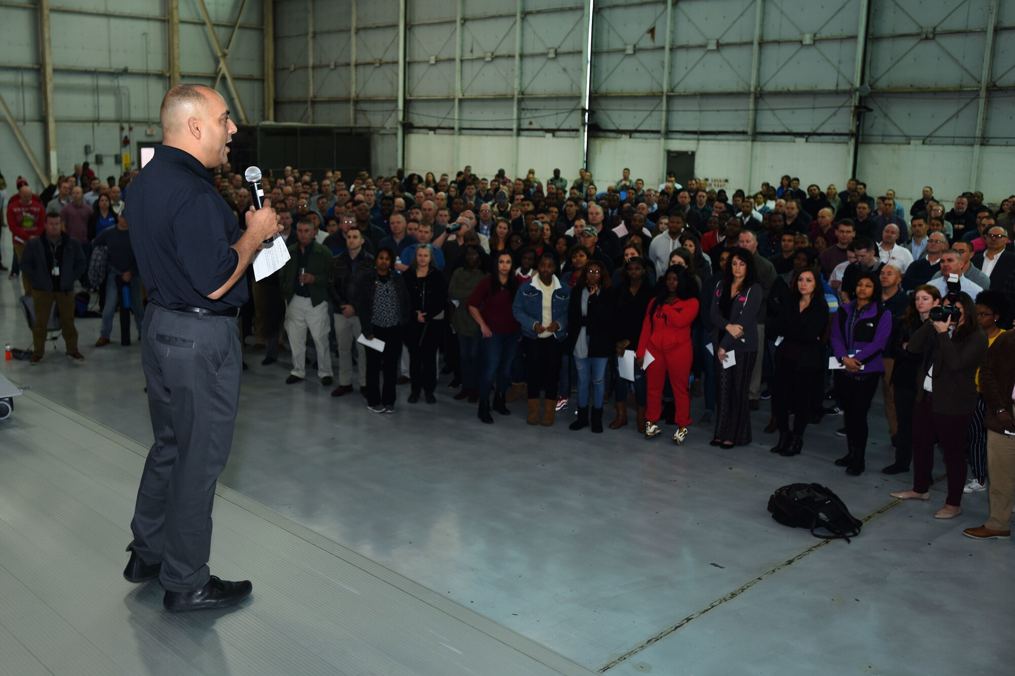 South Carolina Air National Guard personnel assemble in the aircraft hangar to participate in personal resilience training.