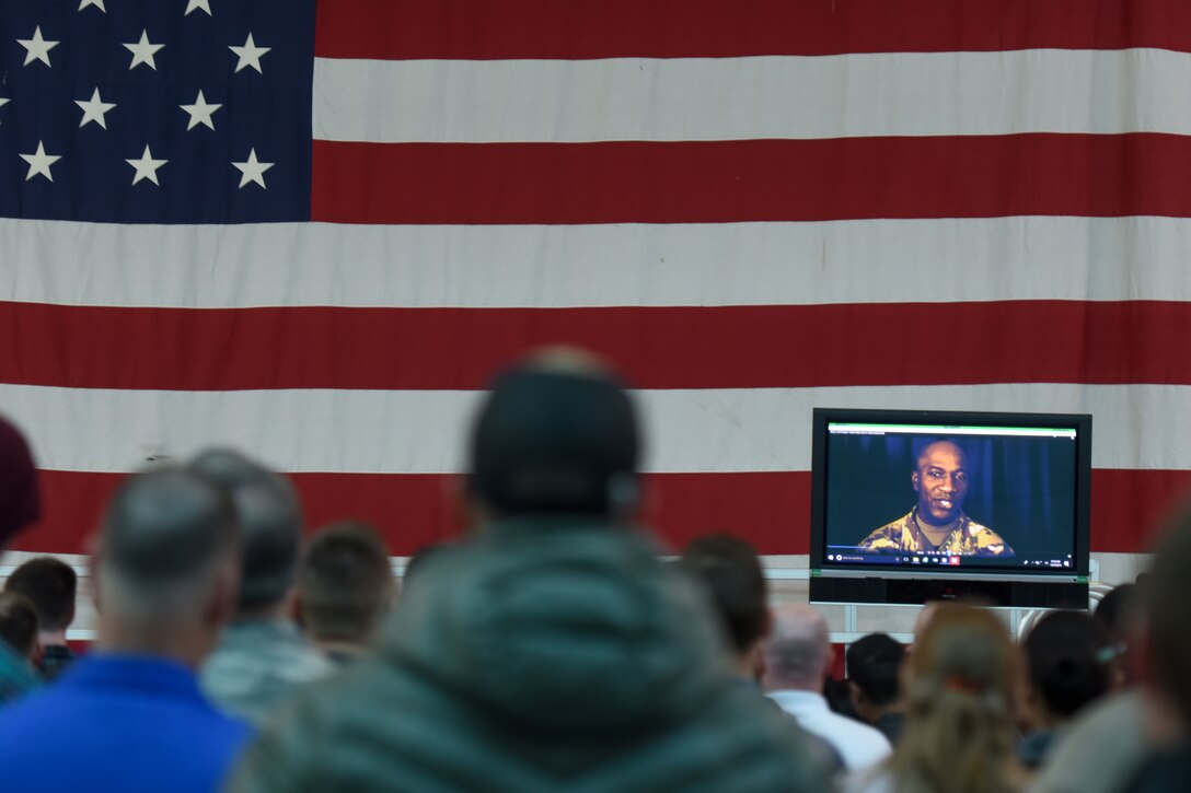 South Carolina Air National Guard personnel assemble in the aircraft hangar to participate in personal resilience training.