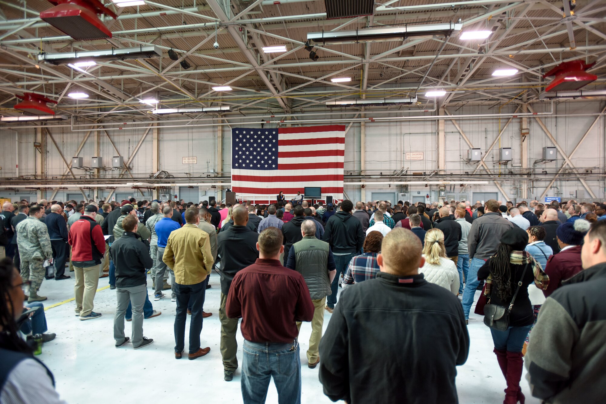 South Carolina Air National Guard personnel assemble in the aircraft hangar to participate in personal resilience training.