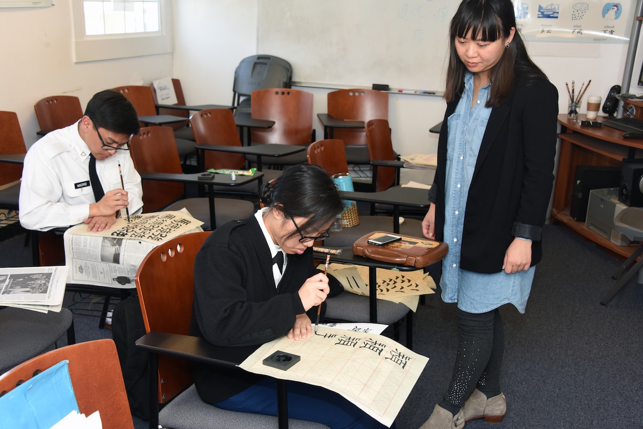Students at the Defense Language Institute Foreign Language Center who are studying Chinese can also practice calligraphy as an extracurricular activity. As one of the oldest written scripts in the world, Chinese characters remain in use today. Calligraphy, which is thousands of years old, is still widely taught and practiced, opening a window for students to be more exposed to Chinese culture. (US Army photo by Patrick Bray)