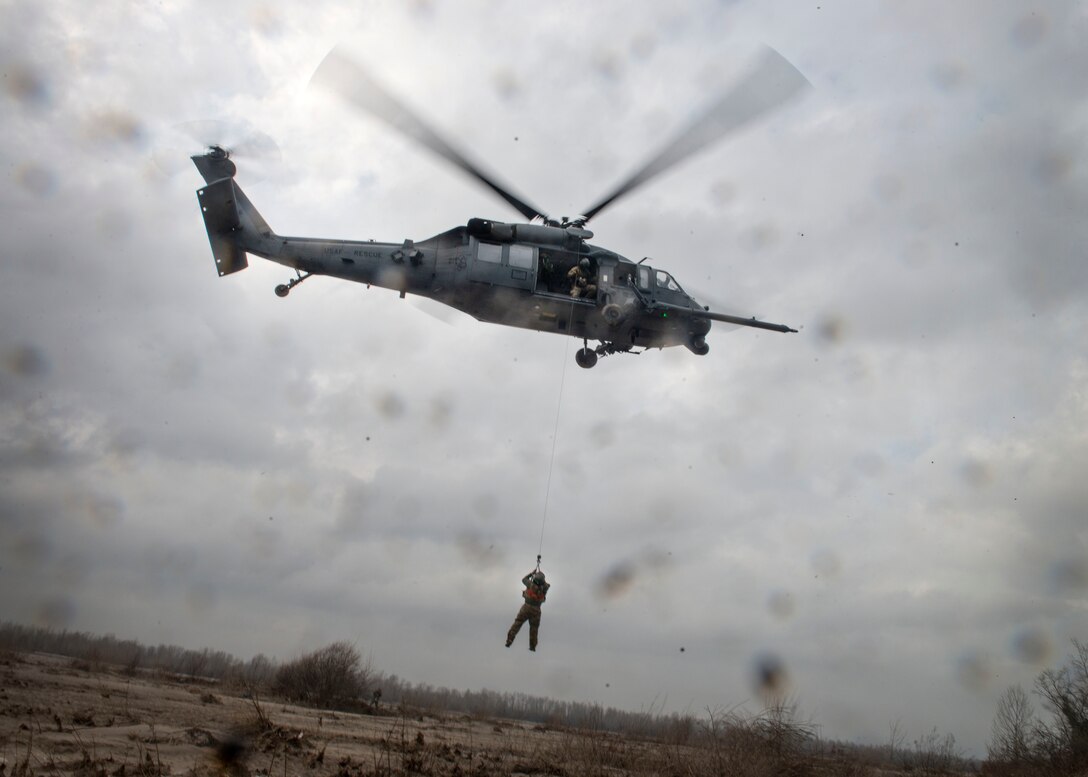 Members of the 56th Rescue Squadron practice rescue techniques at Aviano, Italy, Dec. 17, 2019. The 56th RQS integrates with the Guardian Angels weapon system and other special forces to support insertion, extraction and recovery of both U.S. and allied combatants.