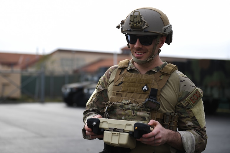 U.S. Air Force Airman 1st Class Tyler McConnell, explosive ordnance team member from the 31 Civil Engineer Squadron, poses for a photo, Dec.18, 2019, at Aviano Air Base, Italy. Explosive ordnance team member are trained to detect, disarm, detonate and dispose of explosive threats all over the world, EODs are the specialists who bravely serve as the Air Force’s bomb squad. (U.S. Air Force photo by Airman 1st Class Ericka A. Woolever).