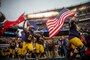 U.S. Naval Academy midshipmen run onto Lincoln Financial Field prior to the Army-Navy football game, Dec. 14, 2019, in Philadelphia, Pa. This year marks the 120th game between the military academies.