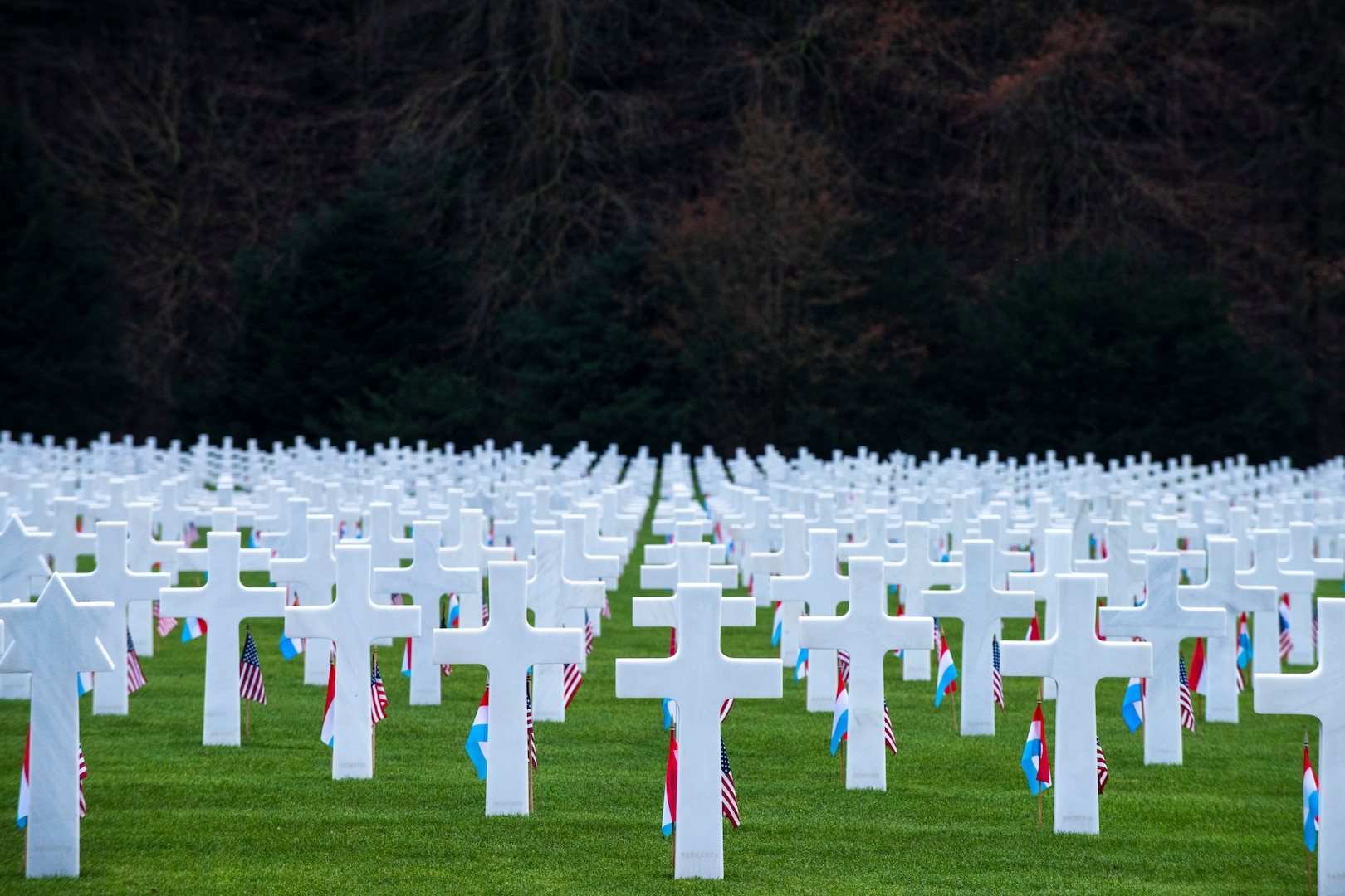 Dr. Mark T. Esper, Secretary of Defense and Army Gen. Mark A. Milley, chairman of the Joint Chiefs of Staff, visit the Luxembourg American Cemetery and Memorial during a ceremony, Dec. 16, 2019. The visit was part of a U.S. delegation tour of the region during the 75th commemoration and anniversary of the Battle of the Bulge. The cemetery, containing 5,073 American war dead, covers 50.5 acres (20.4 ha) and was dedicated in 1960. It is administered by the American Battle Monuments Commission.