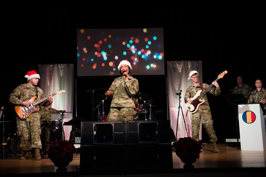 The U.S. Army Training and Doctrine Command Band performs during their holiday concert at Joint Base Langley-Eustis, Virginia, Dec. 12, 2019.