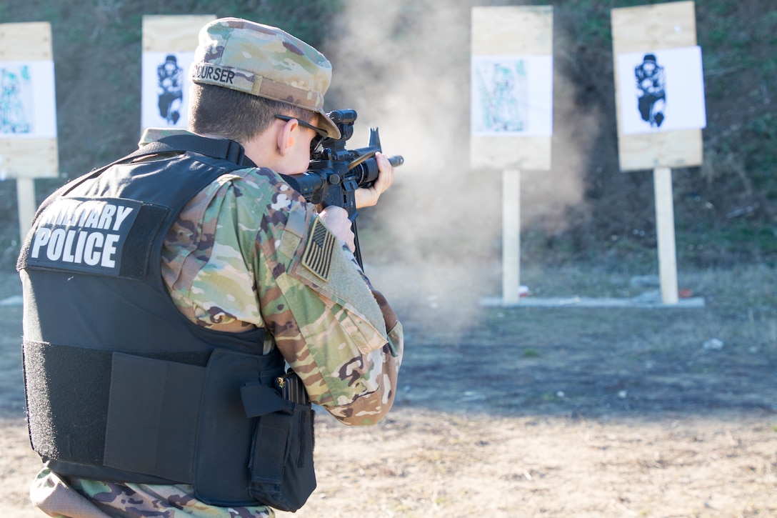 U.S. and Canadian military police conduct weapons training in Romania