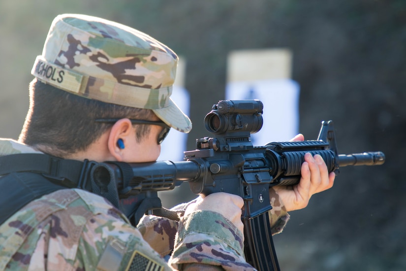 U.S. and Canadian military police conduct weapons training in Romania