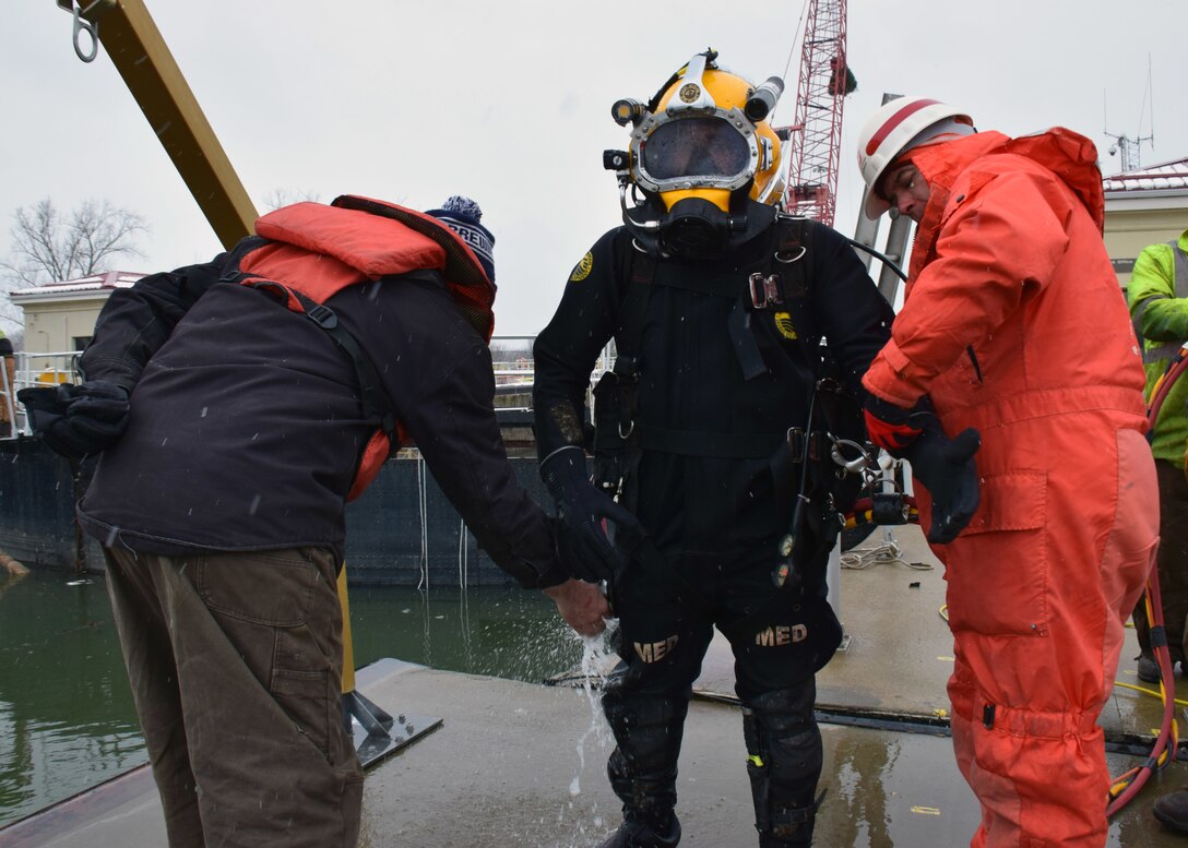 A diver prepares to enter the Black Rock Lock