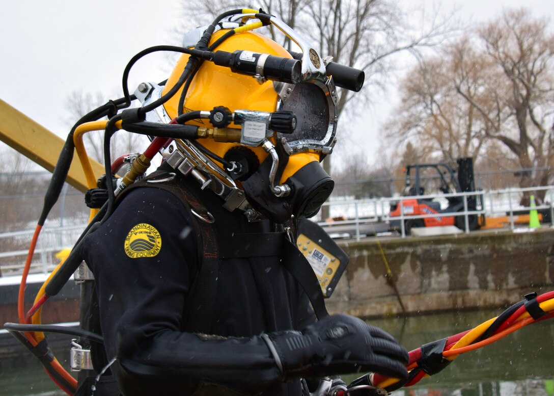 A diver prepares to enter the Black Rock Lock