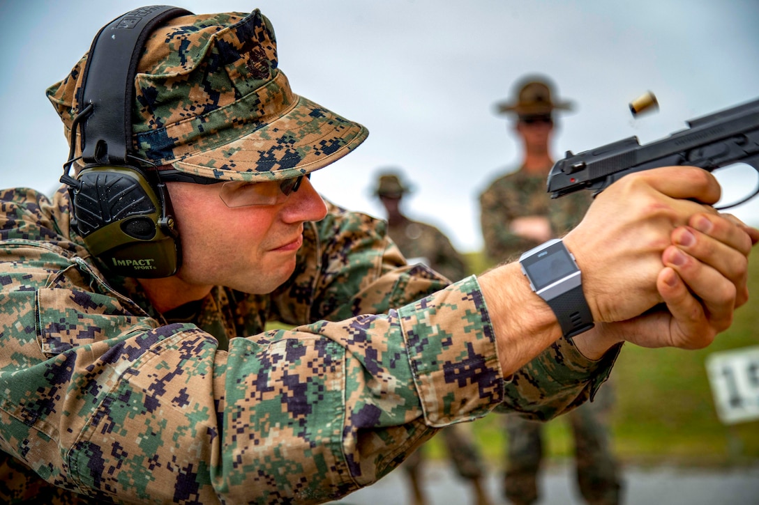 A Marine fires a weapon.