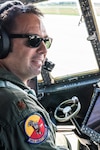 U.S. Air Force Maj. Ed Fattmann, a pilot assigned to the 180th Airlift Squadron, Missouri Air National Guard, takes his first flight as an aircraft commander with one eye, above St. Joseph, Missouri, Sept. 4, 2019.