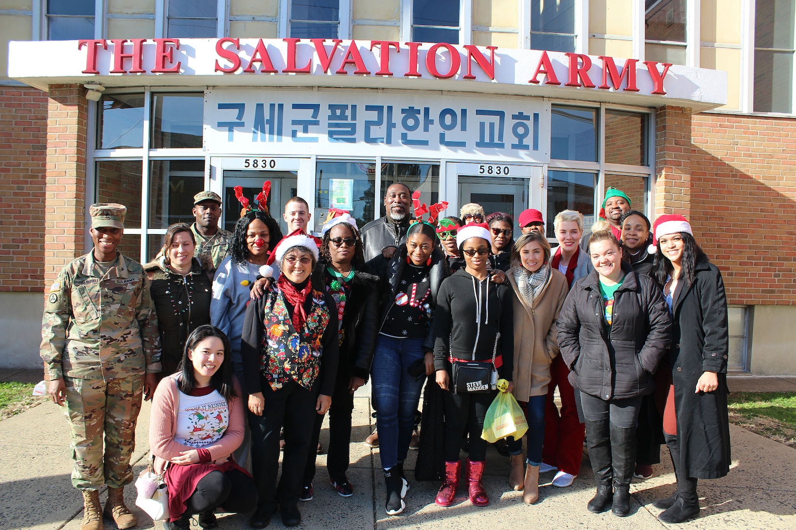 DLA Troop Support volunteers pose for a photo during the DLA Troop Support Children’s Holiday Party Dec. 12, 2019 in Philadelphia.