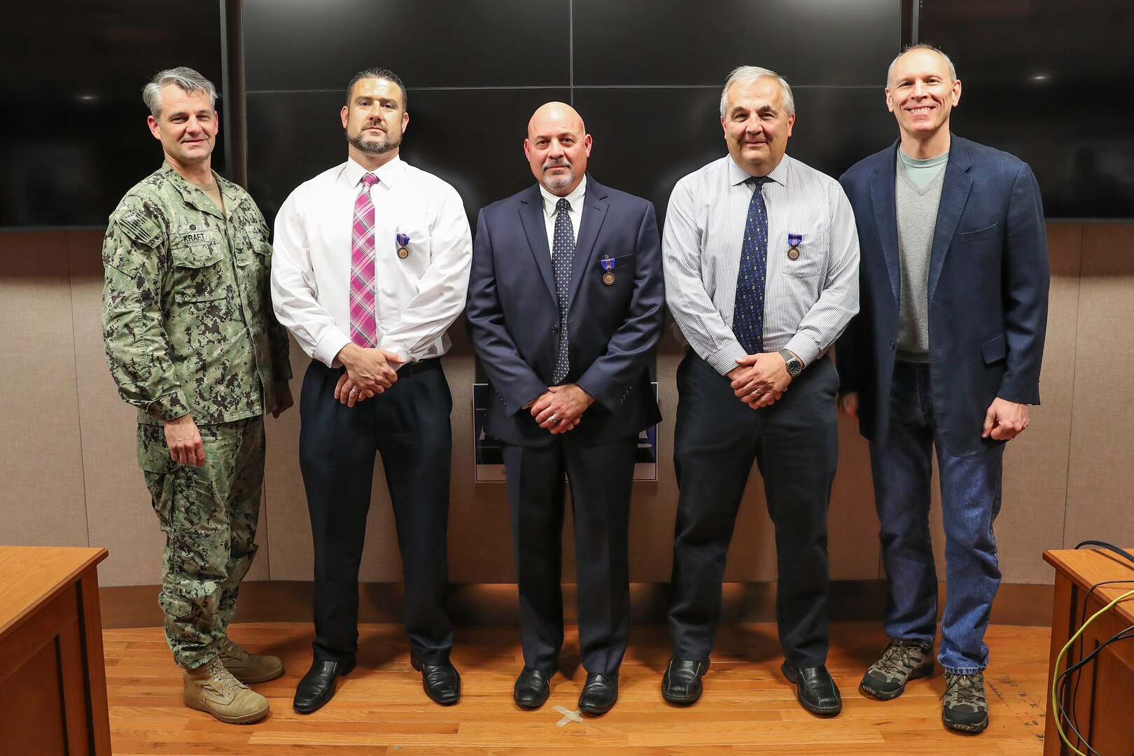 Human Resources Director Bill Shea, Systems Engineering Department Head Mike Thornton and retired Mechanical Engineer Gregory Harris received Department of the Navy Meritorious Civilian Service Awards from NSWC IHEODTD Commanding Officer Capt. Scott Kraft and Technical Director Ashley Johnson. Not pictured: Chemical, Biological and Radiological Defense Division Principal Engineer Bruce Corso. (U.S. Navy photo by Matt Poynor)