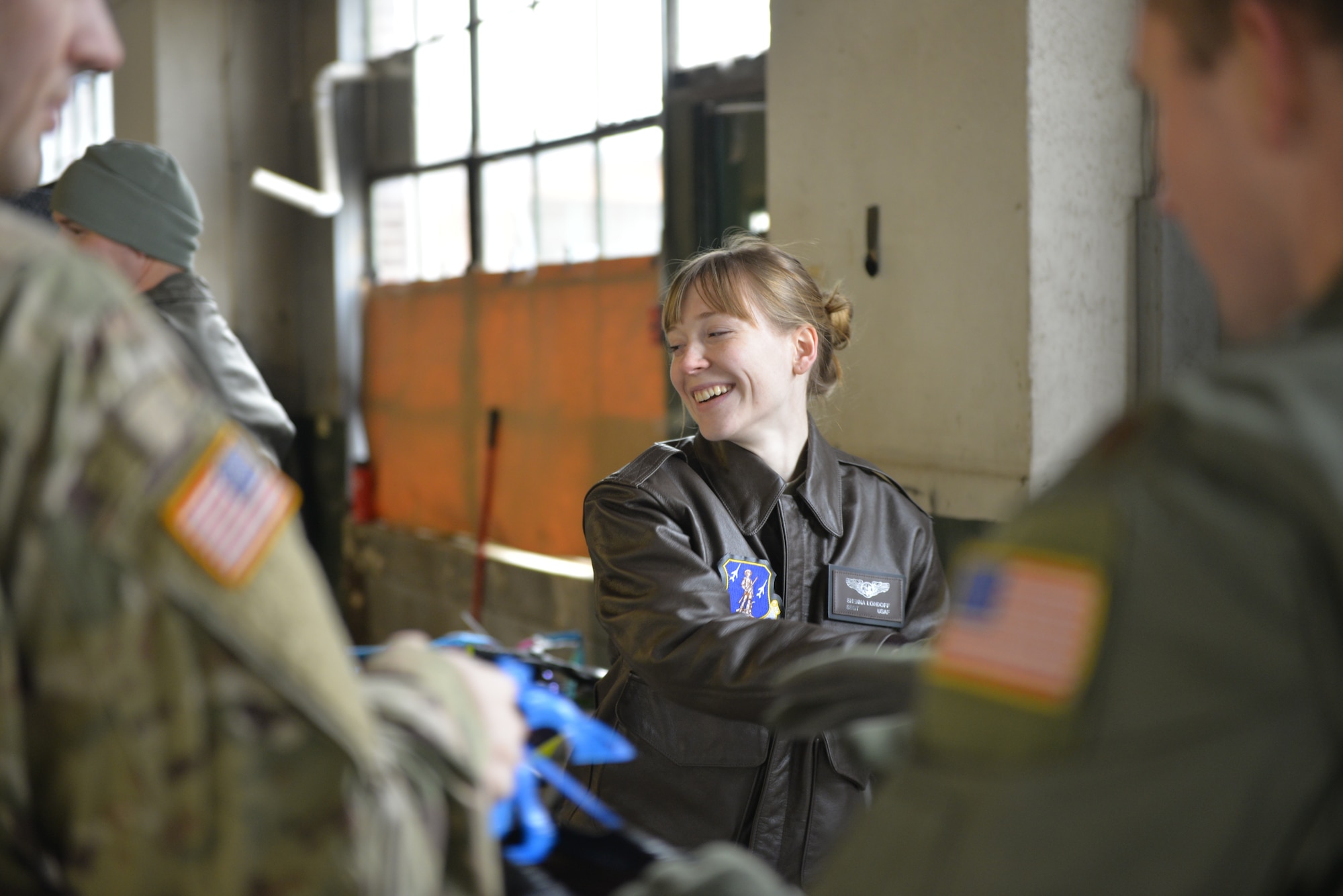 Staff Sgt. Shenna Londoff with the 157th Operations Group, New Hampshire Air National Guard, helps load donated Christmas gifts as part of Operation Santa Claus on Dec. 16 in Concord. Volunteers from the State Employees' Association, SEIU Local 1984, partner with N.H. guardsmen annually to transport presents to distribution points throughout the state. The program has been led by the SEA since 1960, and ensures gifts are provided to thousands of NH children in need. (U.S. Air National Guard photo by Tech. Sgt. Aaron Vezeau)