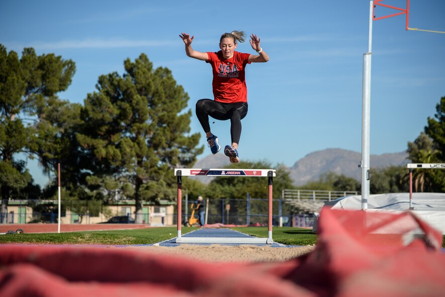 Athlete does high jump training