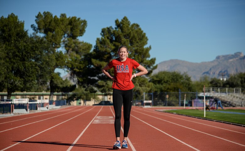 Athlete does cool-down exercise