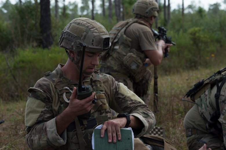 U.S. Air Force Staff Sgt. Phillip Wise, a 6th Civil Engineer Squadron explosive ordnance disposal (EOD) flight technician, uses a radio to call for a medical evacuation team during a field training exercise Dec. 11, 2019, at Avon Park Air Force Range, Fla. Wise conducted procedures to call for a medical evacuation team for simulated casualties during the training exercise.