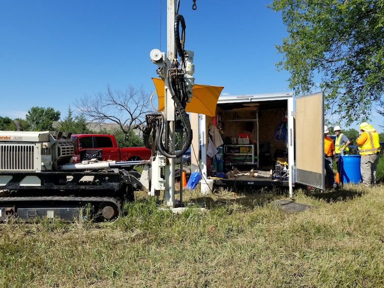 The membrane interface and hydraulic profiling tool (MiHPT) rig. Multiple probes are submerged approximately 100 feet below ground while real-time data is monitored within the trailer.