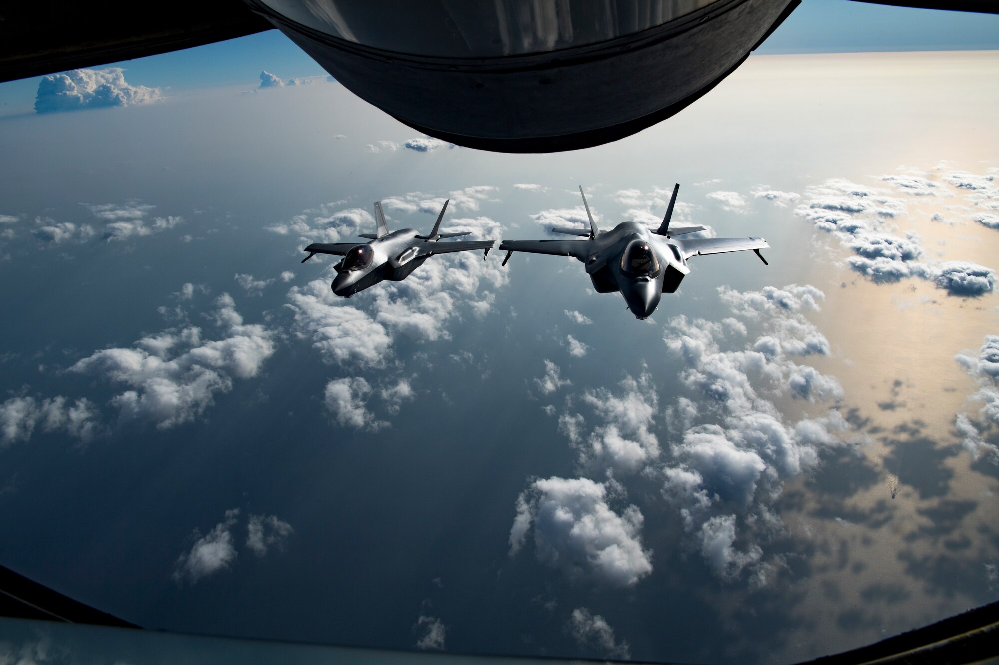 Two U.S. Air Force F-35A Lightning IIs assigned to the 34th Expeditionary Fighter Squadron fly above the Arabian Gulf, Dec. 3, 2019.