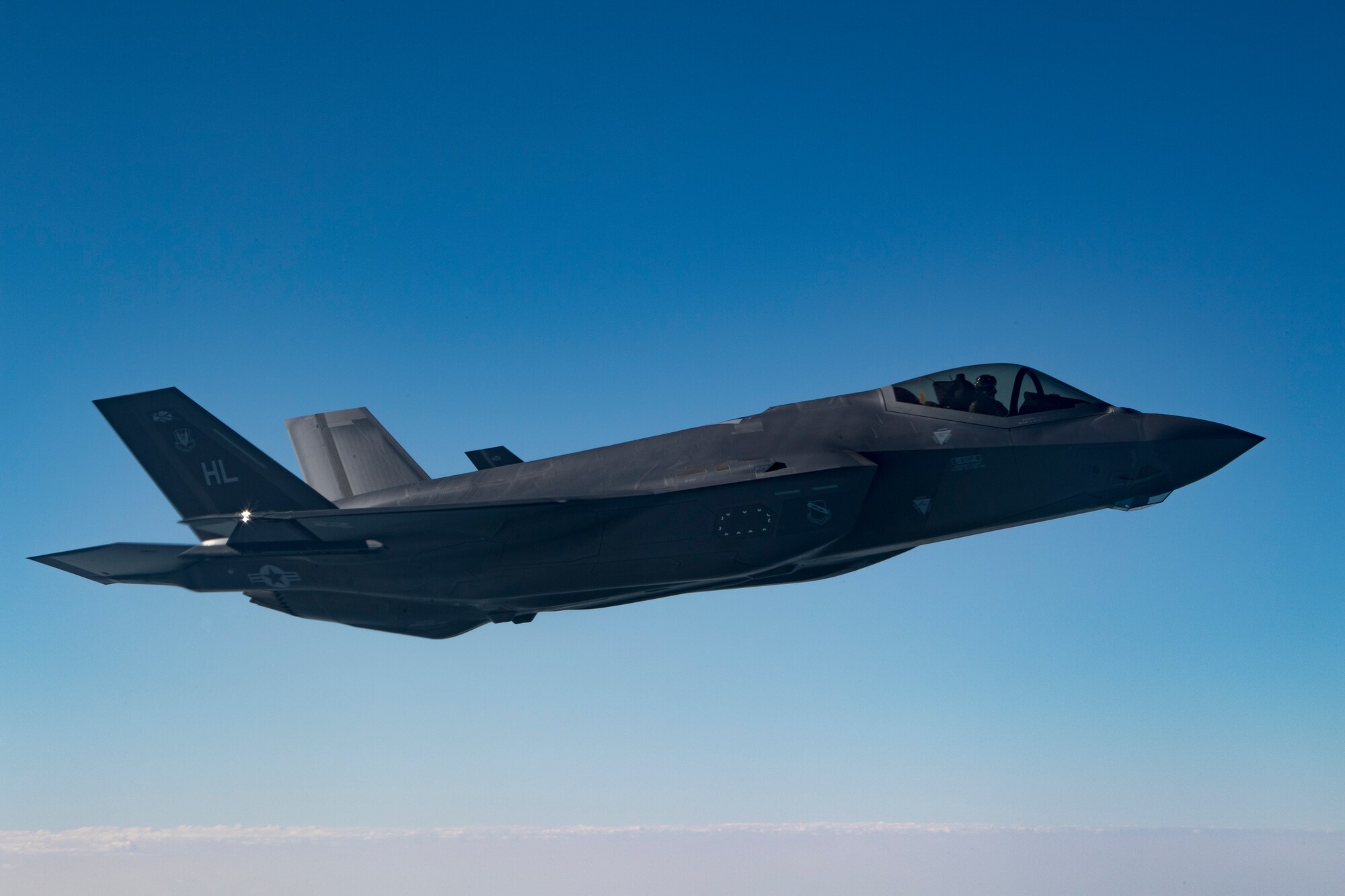 Two U.S. Air Force F-35A Lightning IIs assigned to the 34th Expeditionary Fighter Squadron fly above the Arabian Gulf, Dec. 3, 2019.