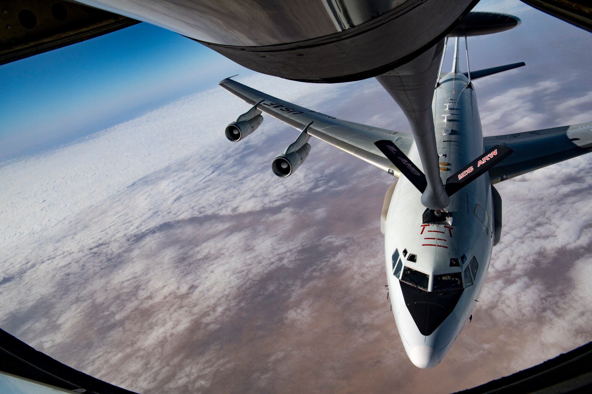 A U.S. Air Force E-3 Sentry assigned to the 968th Expeditionary Airborne Air Control Squadron receives fuel from a U.S. Air Force KC-135 Stratotanker assigned to the 28th Expeditionary Air Refueling Squadron above the Arabian Gulf, Dec. 3, 2019.