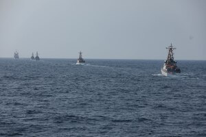 U.S. Navy and Coast Guard ships sail in formation, during Griffin Missile Exercise 19. The exercise demonstrated a proven capability for the ships to defend themselves against small boat threats and ensure maritime security through key chokepoints in the U.S. Central Command area of responsibility.